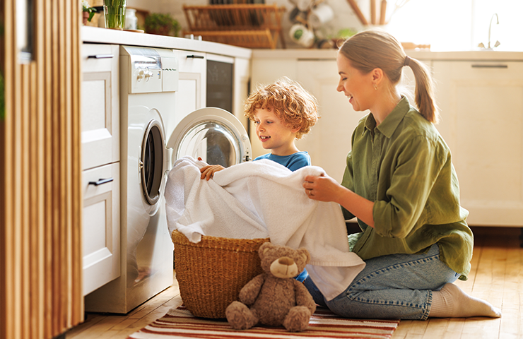 Comment vider le filtre à peluches de mon sèche-linge 